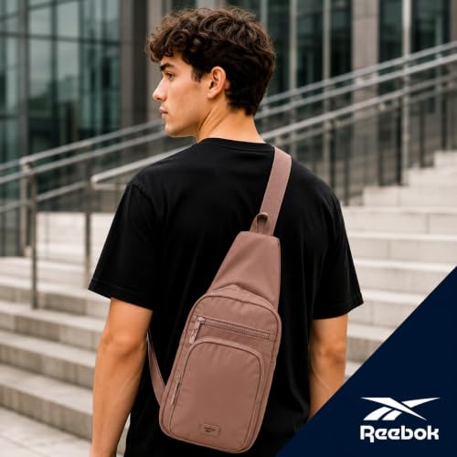 Reebok Unisex Crossbody Bag - Convertible Compact Durable Cross Body Bag for Women and Men - Gym and Travel Essentials, Size One Size, Cosmos Choco Malt - color: Cosmos Choco Malt