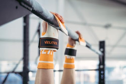 Velites - Official Games Quad Pro Grips - with Chalk - Wristbands Included - Pull-ups, Muscle-ups, and Toes-to-bar - color: Orange, size: Large