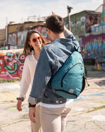 WATERFLY Sling Bag Sling Backpack Small Crossbody Shoulder Bag for Men Women Traveling Cycling Hiking Daypack - color: Teal Blue