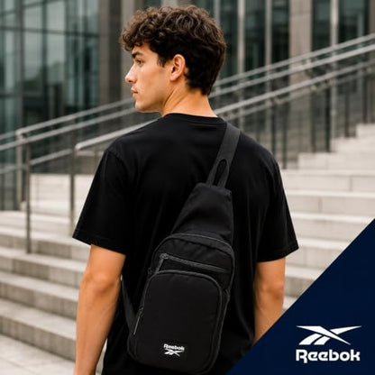 Reebok Unisex Crossbody Bag - Convertible Compact Durable Cross Body Bag for Women and Men - Gym and Travel Essentials, Size One Size, Cosmos Black With White Logo - color: Cosmos Black With White Logo