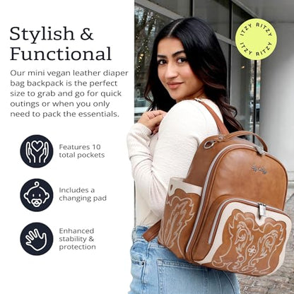 Itzy Ritzy Mini Diaper Bag Backpack – Chic, Compact Mini Plus Backpack with Changing Pad, 10 Pockets (6 Internal, 4 External), Grab-Top Handle & Rubber Feet (Saddle) - color: Saddle