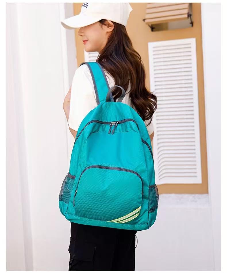 Geboldil Men's and women's waterproof backpack traveling backpack peacock green - color: Peacock Green